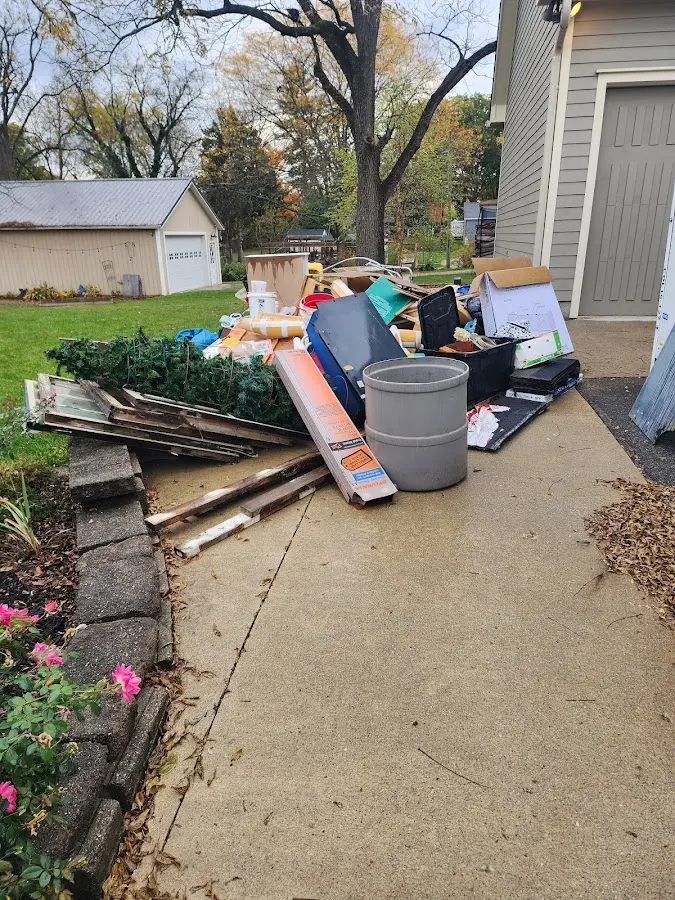 Dumpster being loaded with debris for Residential Dumpster Rental in Sinking Spring